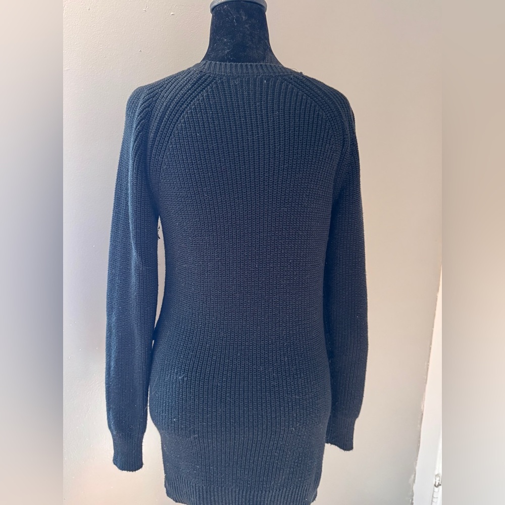 Elegant Black Sweater with Unique Knot Design